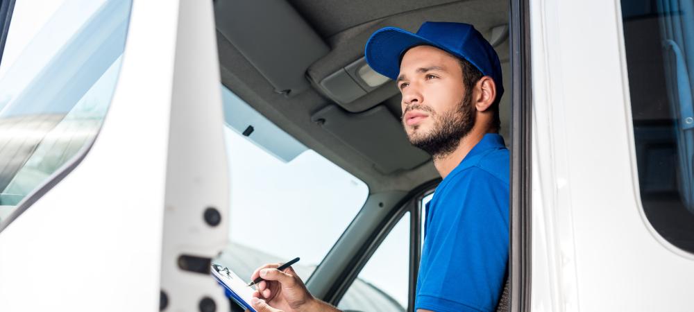 Pest Inspector in Car with Clip-board